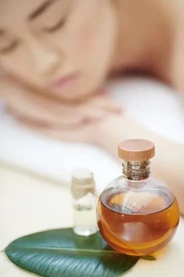 Step-by-step guide on creating personalized aromatherapy oils using natural ingredients for a soothing and aromatic experience