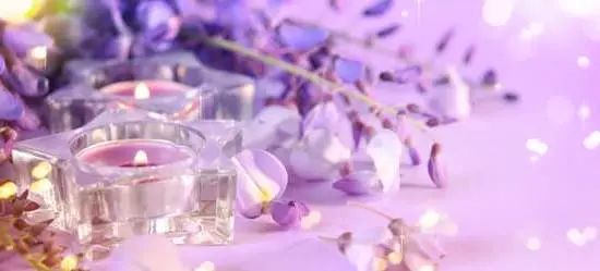 Aromatherapy, as defined by Milady, refers to the therapeutic use of essential oils for promoting physical and psychological well-being