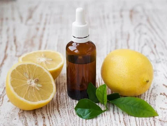 Image: Various essential oils and aromatic plants, representing the elements of aromatherapy meaning