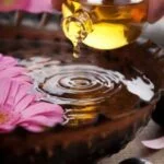 Relax and rejuvenate with Aromatherapy Synergy Body Oil for ultimate stress relief and nourished skin