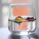 Image of COTSWOLD ACADEMY AROMATHERAPY logo with natural essential oils and holistic wellness education