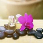 Essential oil bottles in a row, list of aromatherapy oils