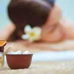 How can aromatherapy enhance orthodox medicine's efficacy and patient experience