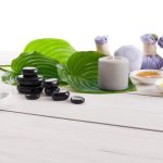 Aromatherapy treats conditions like stress, anxiety, and pain with natural essential oils